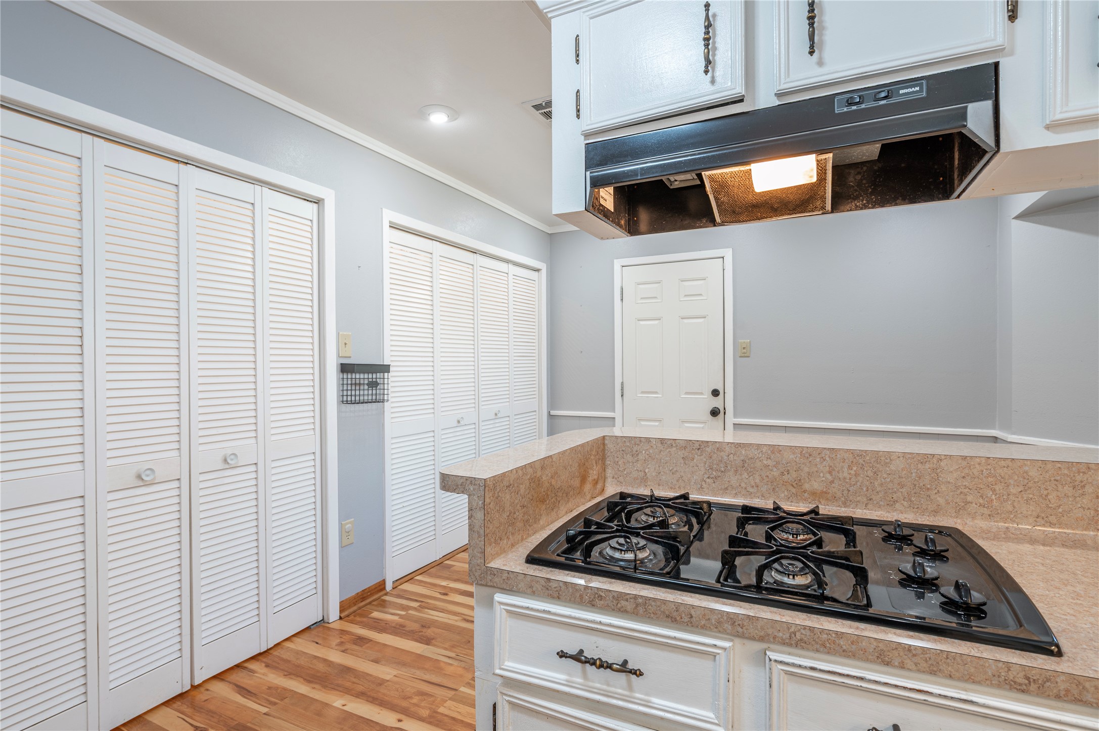 13727 Oleoke Lane Houston, TX 77015 - Photo 16 of 42 a white stove top oven sitting inside of a kitchen