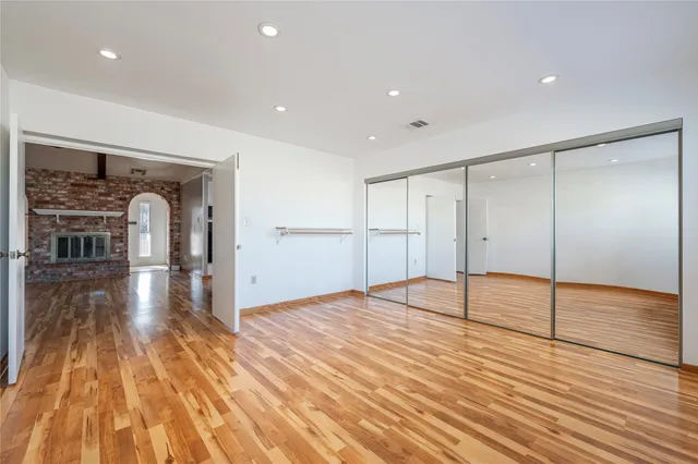 a bathroom with a sink a shower and a mirror
