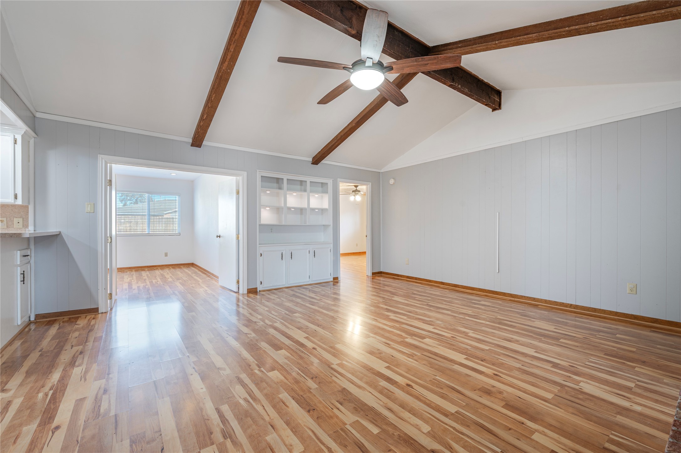 13727 Oleoke Lane Houston, TX 77015 - Photo 7 of 42 wooden floor in an empty room with a window