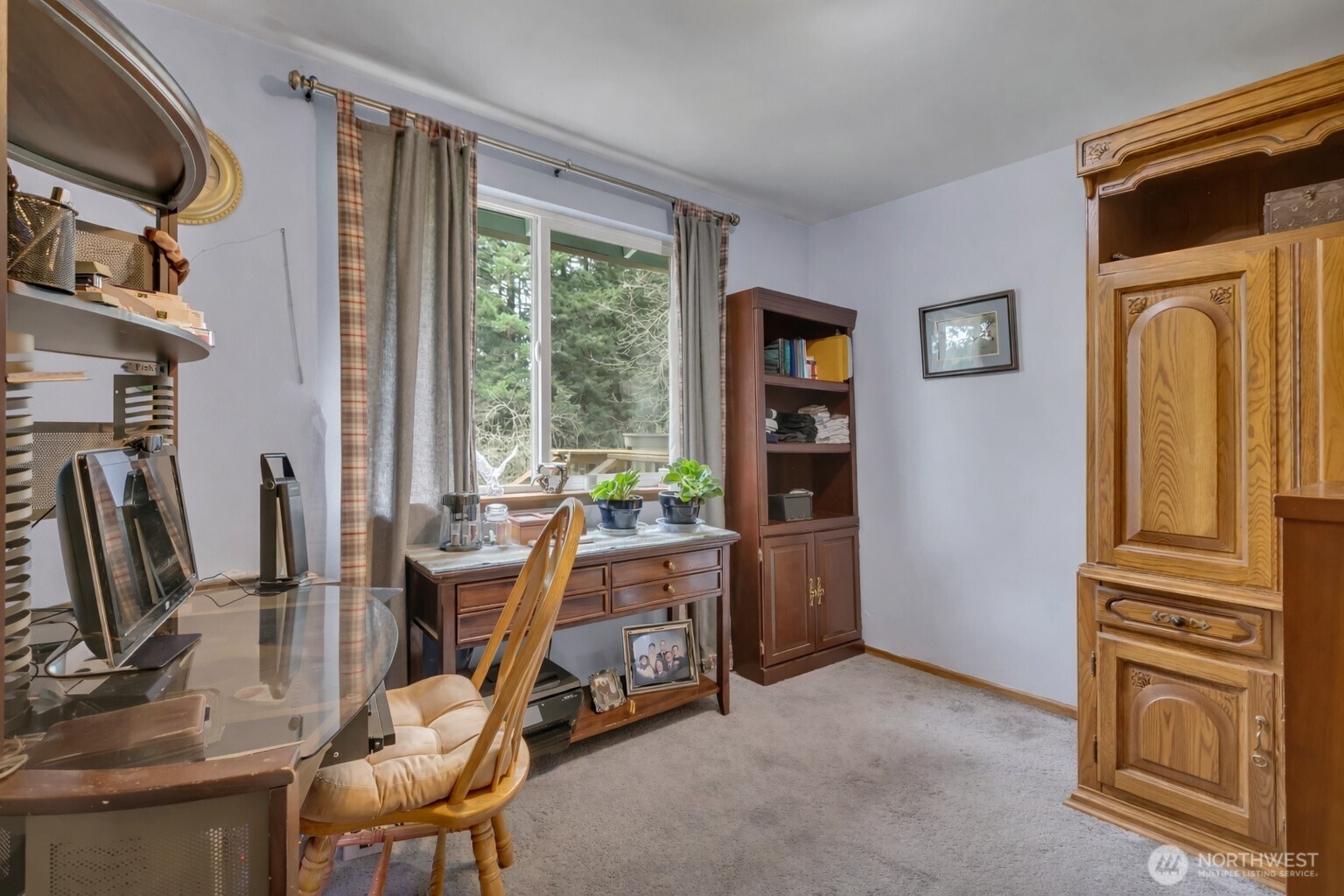 7316 Eustis Hunt Road Spanaway, WA 98387 - Photo 19 of 32 a view of a livingroom with furniture and a window