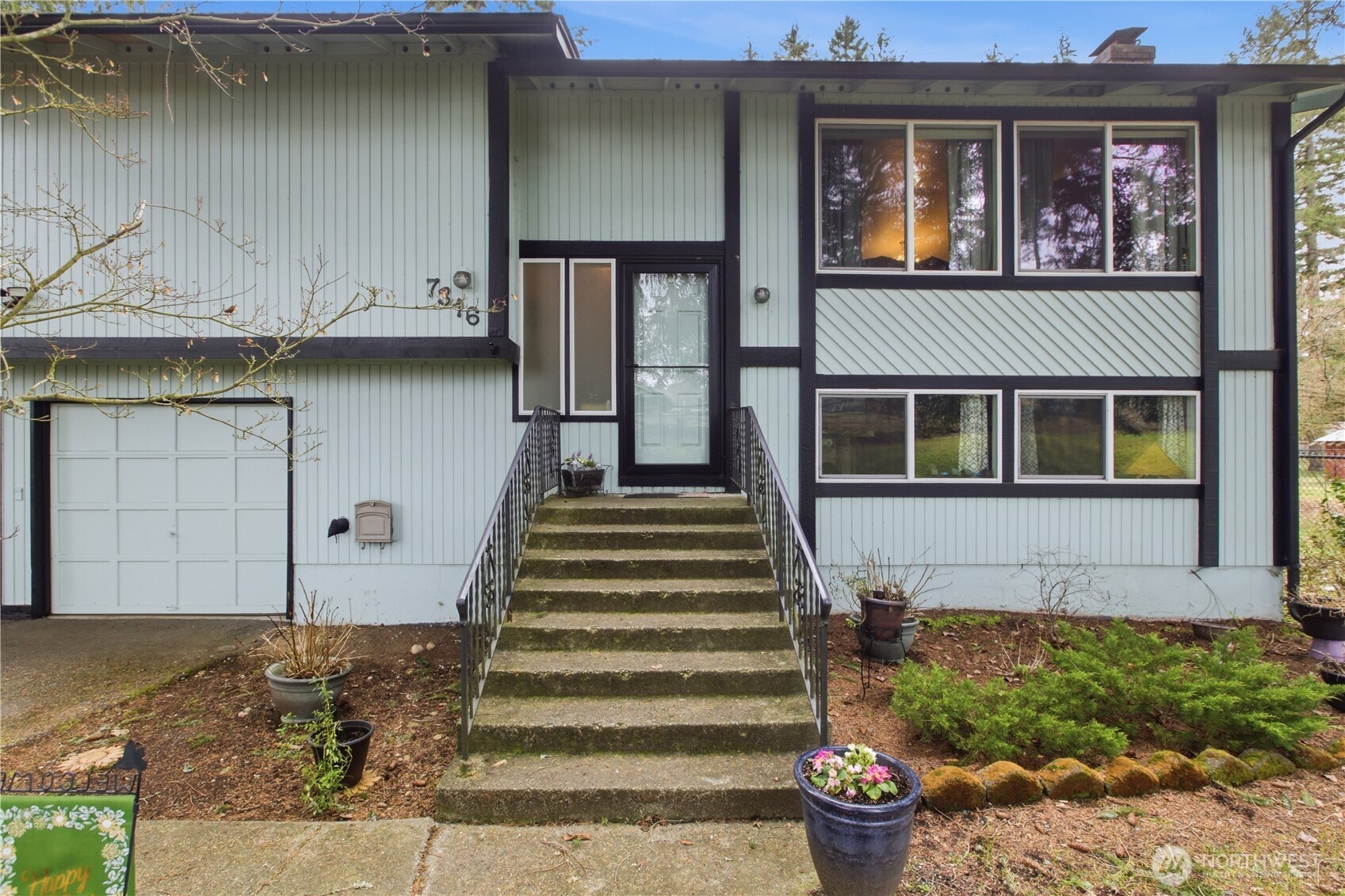 7316 Eustis Hunt Road Spanaway, WA 98387 - Photo 2 of 32 a front view of a house