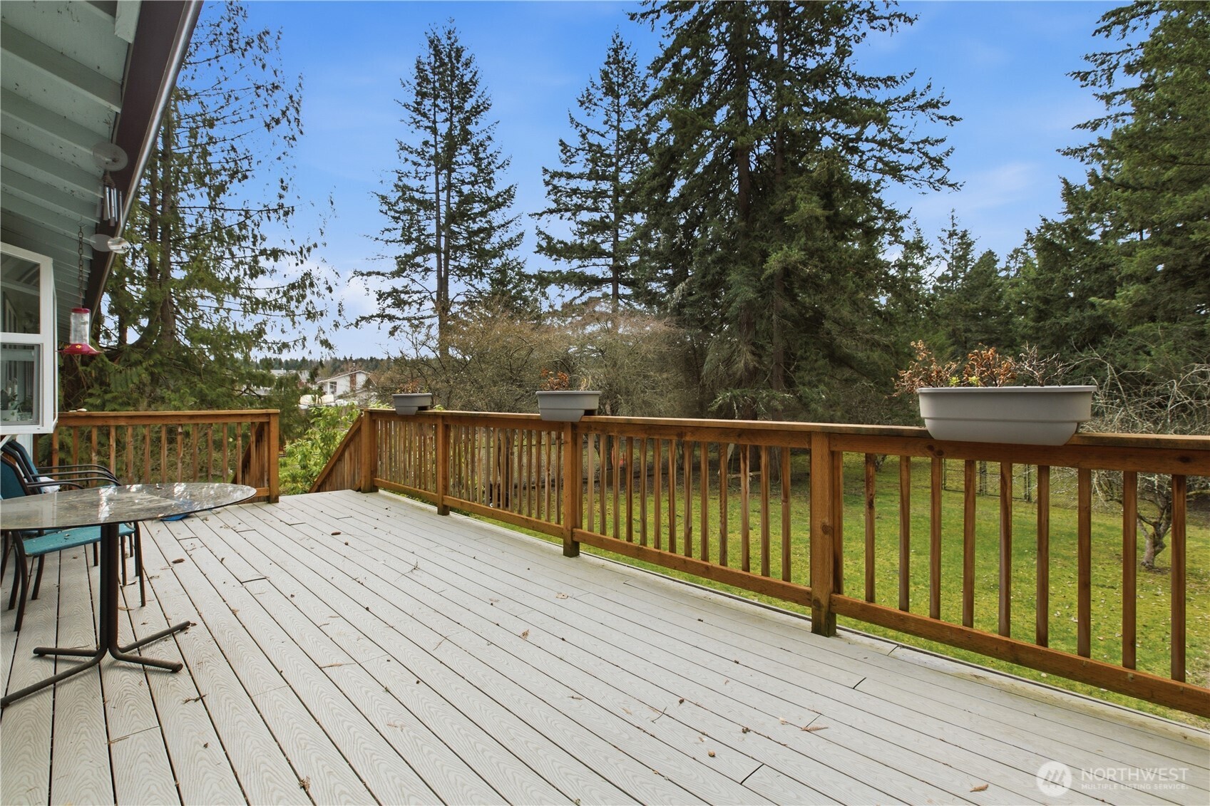 7316 Eustis Hunt Road Spanaway, WA 98387 - Photo 25 of 32 a balcony with wooden floor and fence