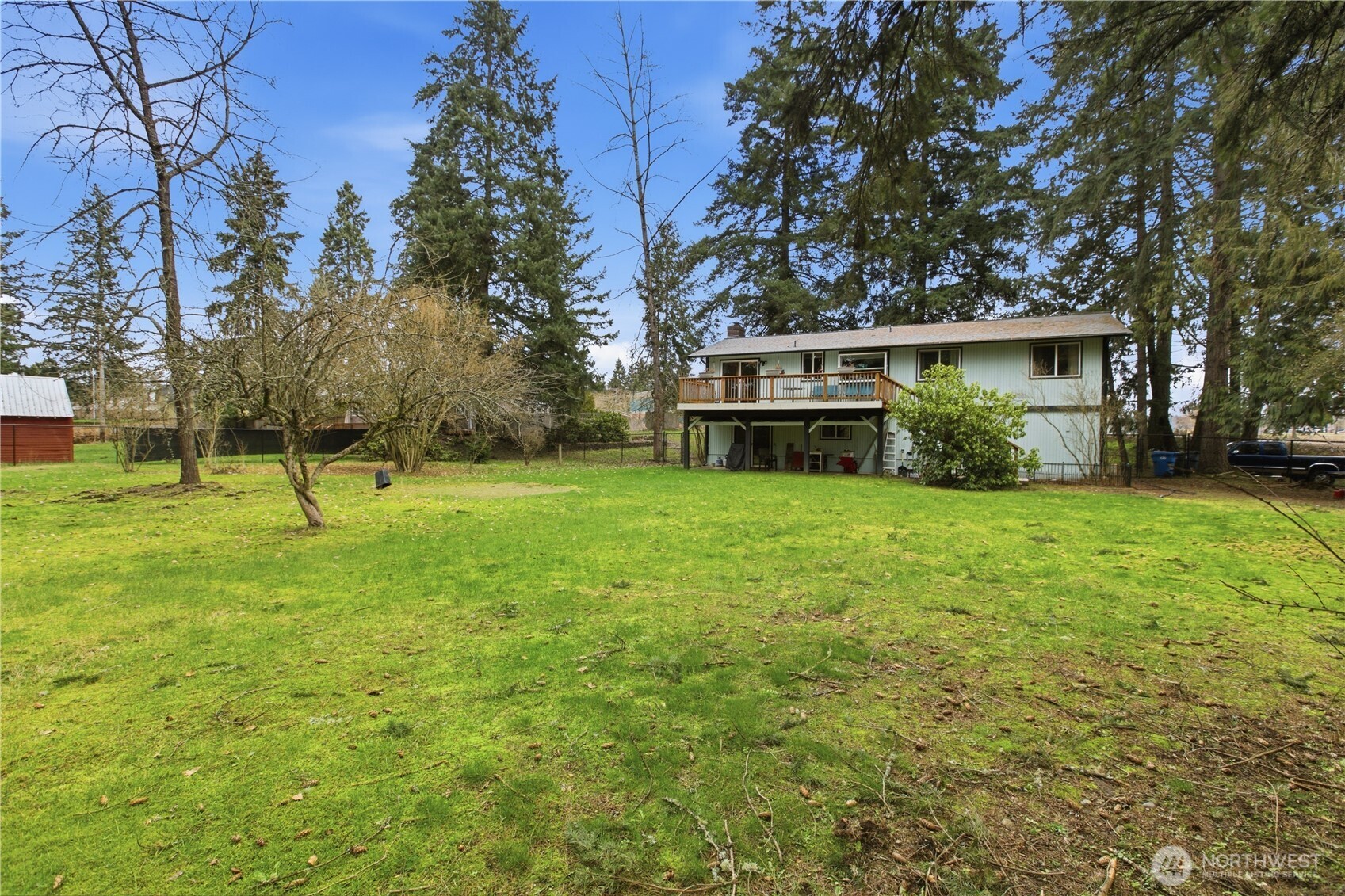 7316 Eustis Hunt Road Spanaway, WA 98387 - Photo 28 of 32 a view of a backyard with a garden