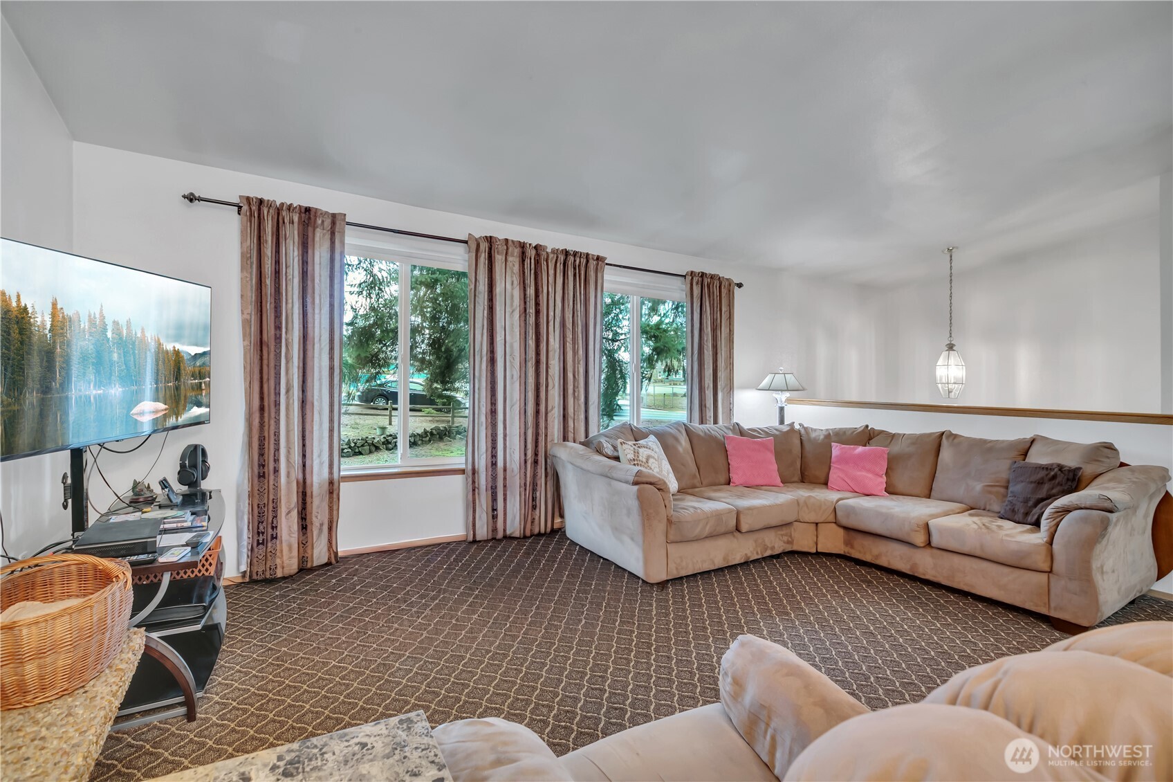 7316 Eustis Hunt Road Spanaway, WA 98387 - Photo 5 of 32 a living room with furniture and a large window