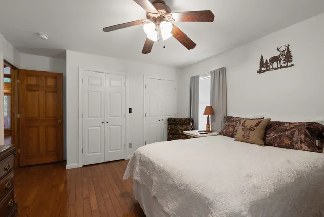 a bathroom with a shower and a sink