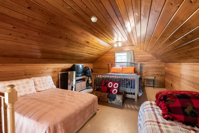 a view of a balcony with chairs