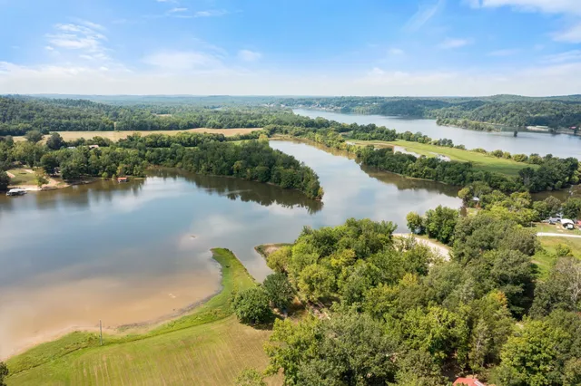 a view of a lake with a yard
