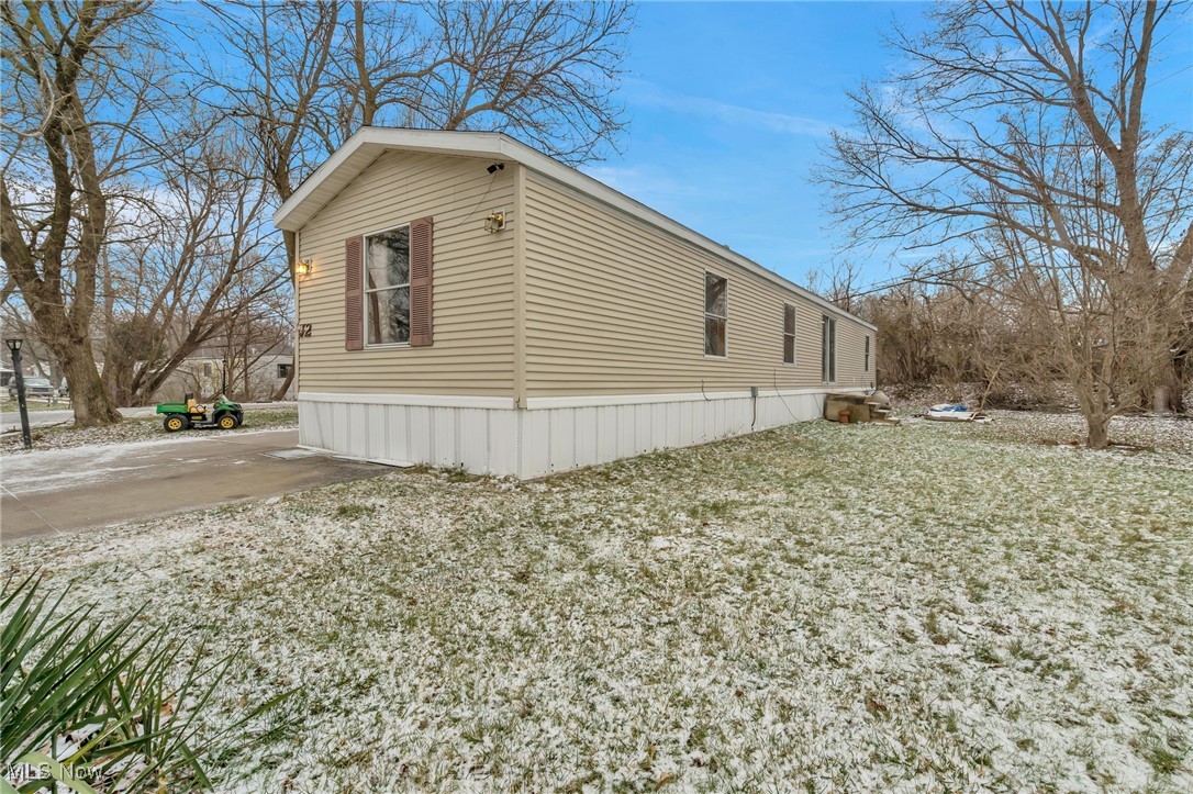 6615 Cleveland Road, Unit J2 Ravenna, OH 44266 - Photo 3 of 15 View of home's exterior