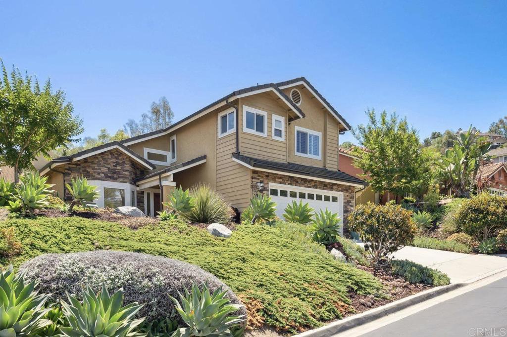 430 Silver Shadow Drive San Marcos, CA 92078 - Photo 1 of 36 a front view of a house with a yard