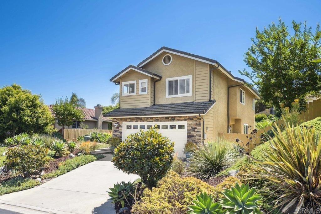 430 Silver Shadow Drive San Marcos, CA 92078 - Photo 34 of 36 a front view of a house with a yard