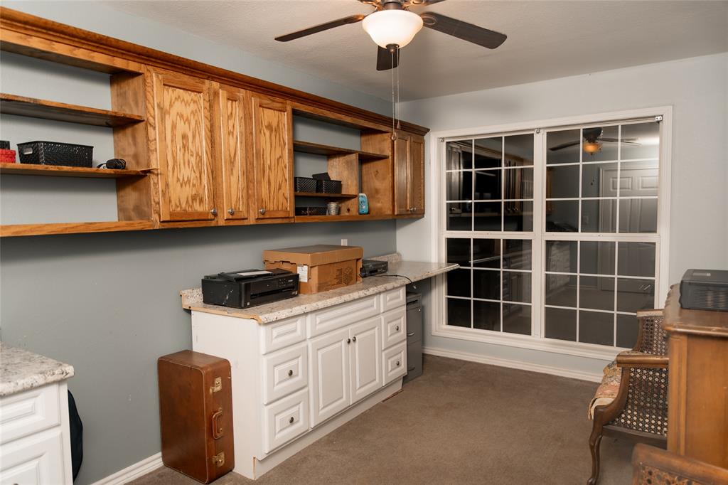 5215 Highway 7 Center, TX 75935 - Photo 21 of 37 Home office featuring dark carpet and ceiling fan
