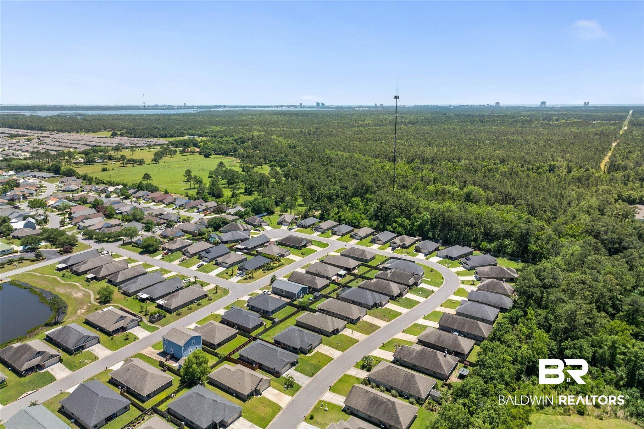 22420 Respite Lane Foley, AL 36535 - Photo 28 of 35 Residential community with a curving street layout and uniform rooflines