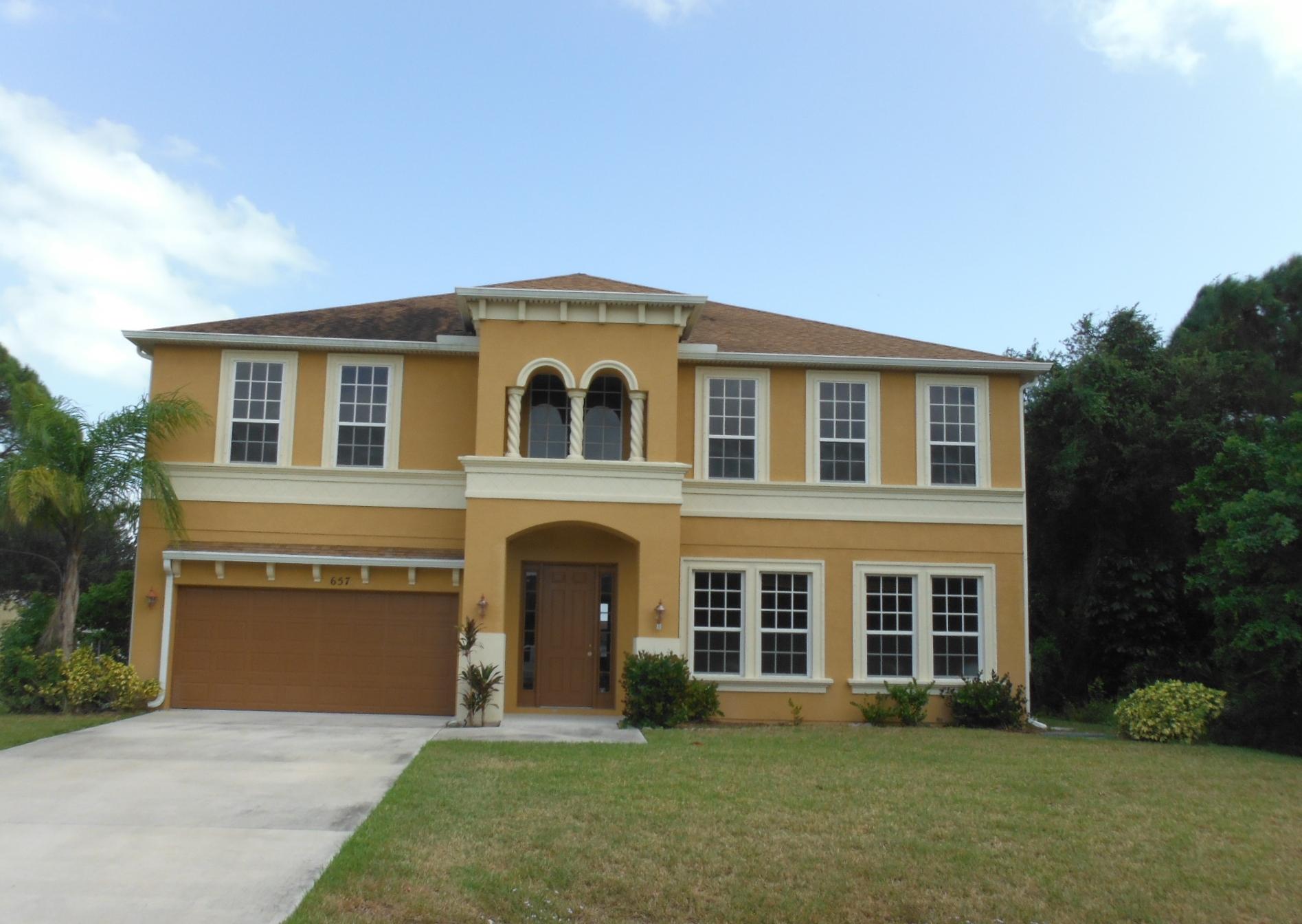 657 Southwest Homeland Road Port St. Lucie, FL 34953 - Photo 1 of 20 Front Elevation