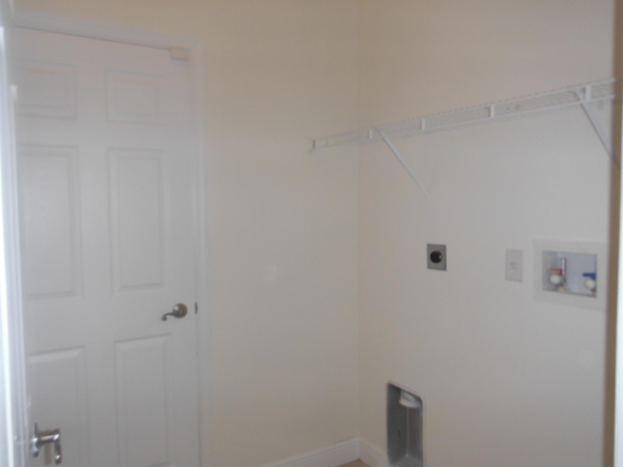 657 Southwest Homeland Road Port St. Lucie, FL 34953 - Photo 11 of 20 11 Laundry Room