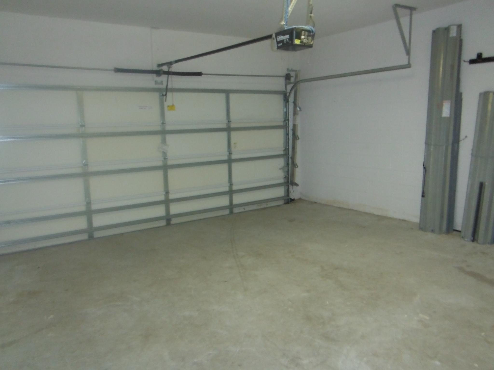 657 Southwest Homeland Road Port St. Lucie, FL 34953 - Photo 12 of 20 12 Garage