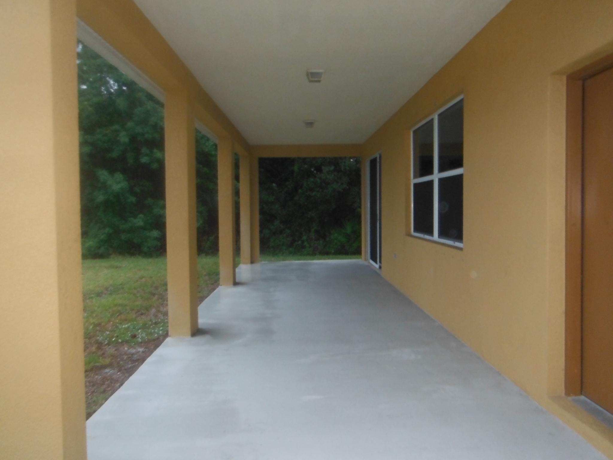 657 Southwest Homeland Road Port St. Lucie, FL 34953 - Photo 20 of 20 20 Patio
