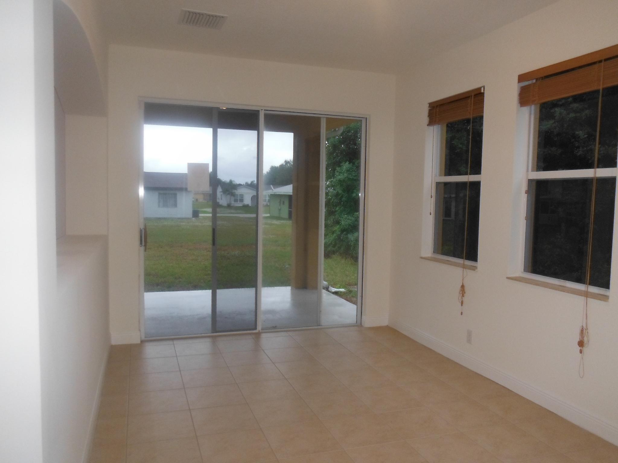 657 Southwest Homeland Road Port St. Lucie, FL 34953 - Photo 7 of 20 6 Family Room