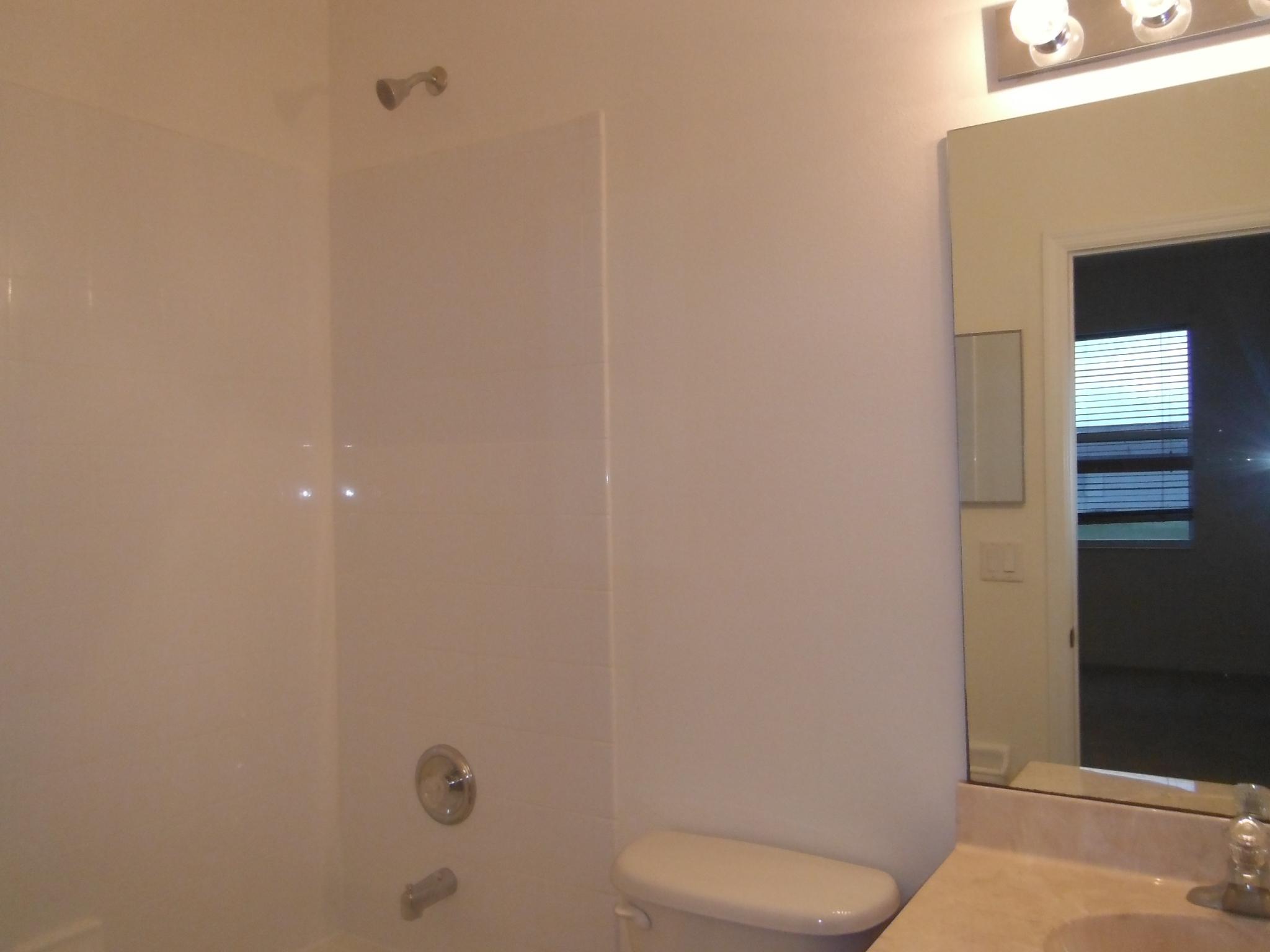 657 Southwest Homeland Road Port St. Lucie, FL 34953 - Photo 9 of 20 8 Downstairs Bathroom