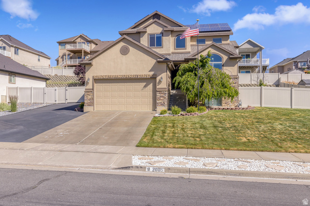 2005 Redtail Way Layton, UT 84040 - Photo 1 of 37 Stucco exterior with stone accents and an attached garage