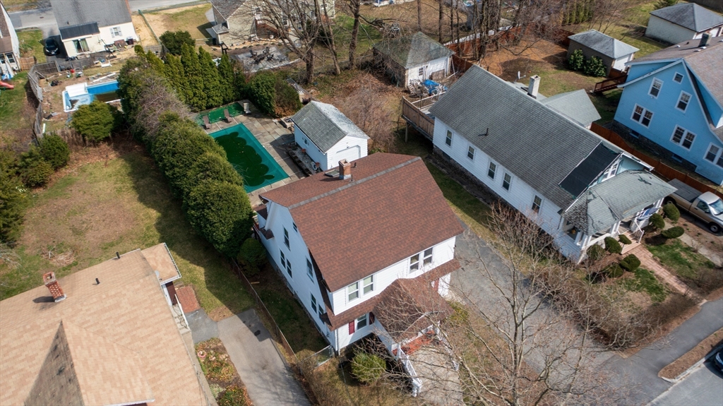 69 Eureka Street Worcester, MA 01603 - Photo 11 of 37 an aerial view of a house with a yard