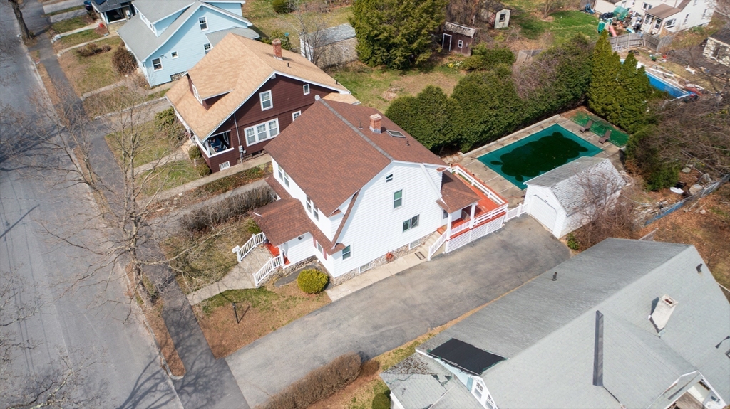 69 Eureka Street Worcester, MA 01603 - Photo 12 of 37 an aerial view of a house with a yard