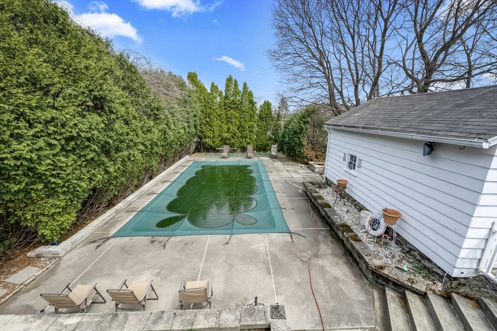 69 Eureka Street Worcester, MA 01603 - Photo 16 of 37 a view of a backyard with swimming pool