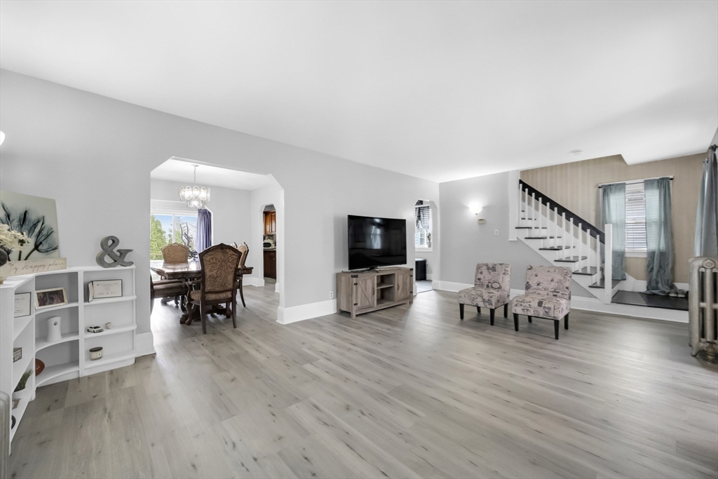 69 Eureka Street Worcester, MA 01603 - Photo 20 of 37 a living room with furniture and a flat screen tv