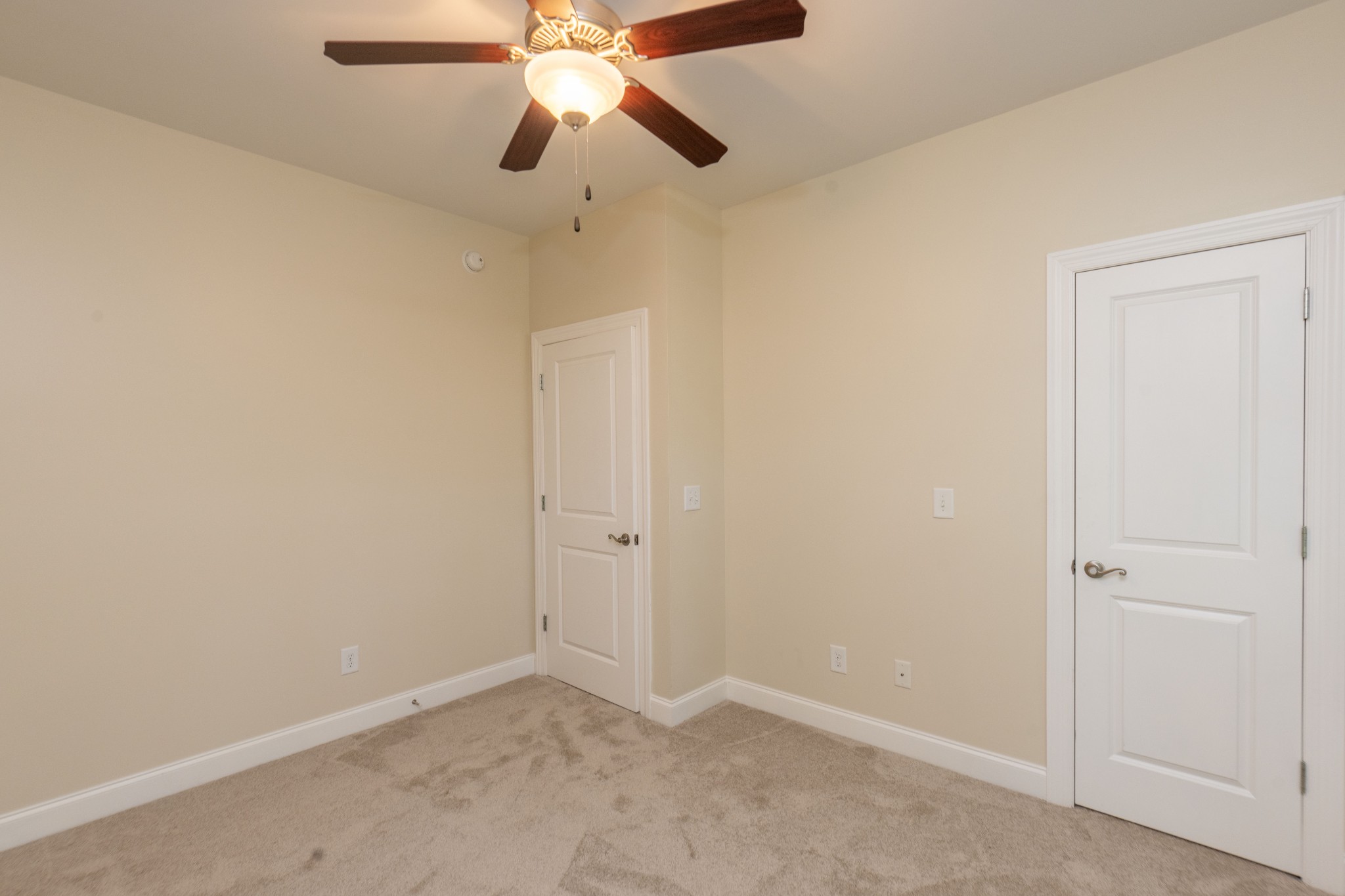 111 Reed's Lane Sewanee, TN 37375 - Photo 15 of 24 an empty room with closet and a chandelier fan