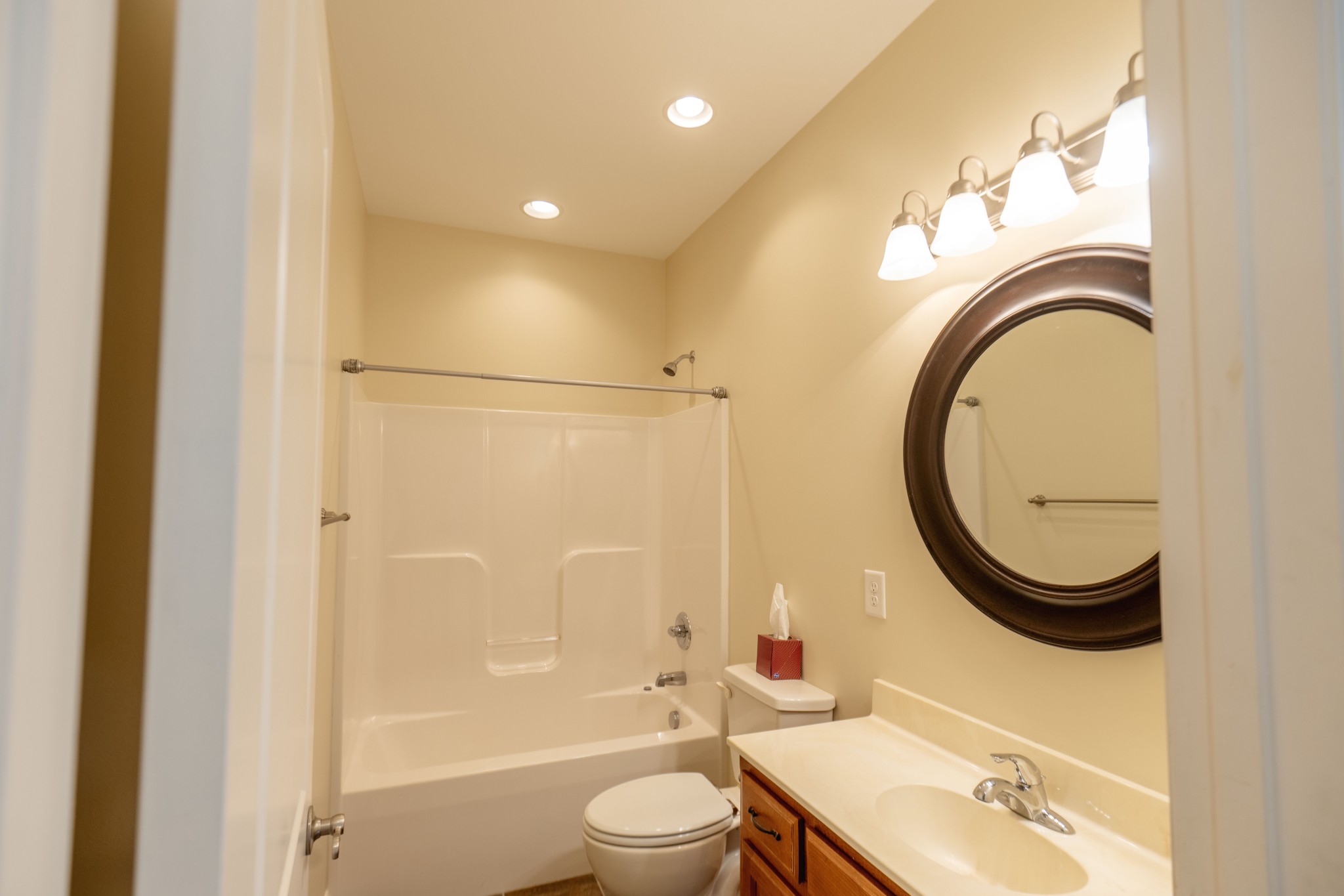 111 Reed's Lane Sewanee, TN 37375 - Photo 17 of 24 a bathroom with a sink a toilet and a mirror