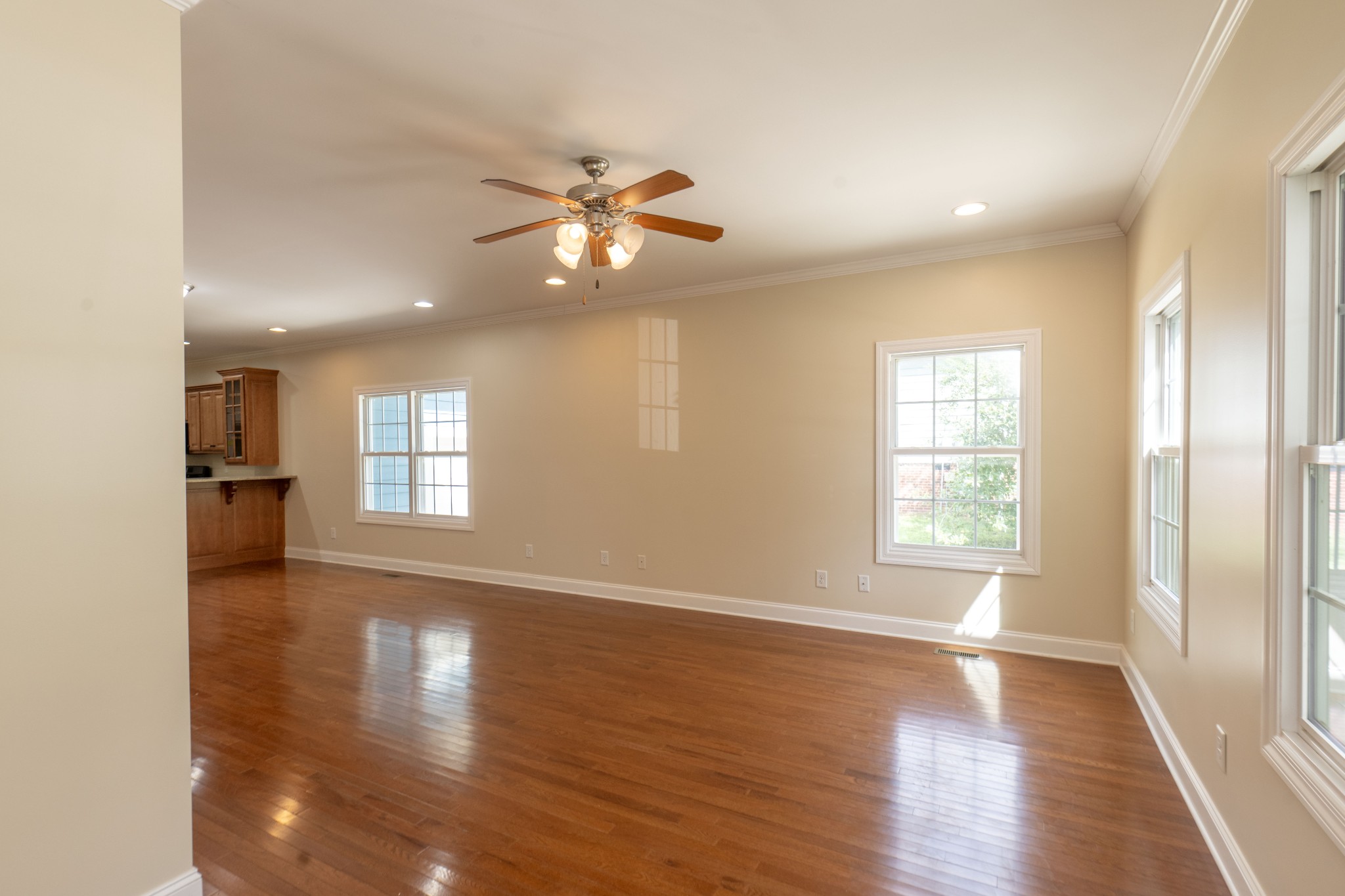 111 Reed's Lane Sewanee, TN 37375 - Photo 3 of 24 a view of an empty room with a window and wooden floor