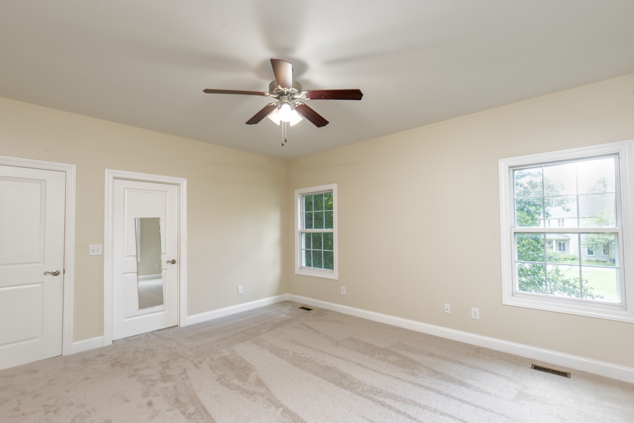 111 Reed's Lane Sewanee, TN 37375 - Photo 9 of 24 a view of empty room with wooden floor and fan