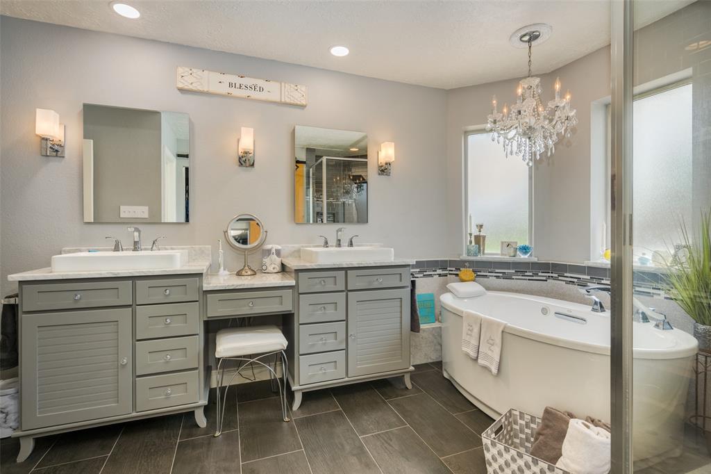 1 Finley Circle Krum, TX 76249 - Photo 14 of 30 a bathroom with a double vanity sink mirror and double