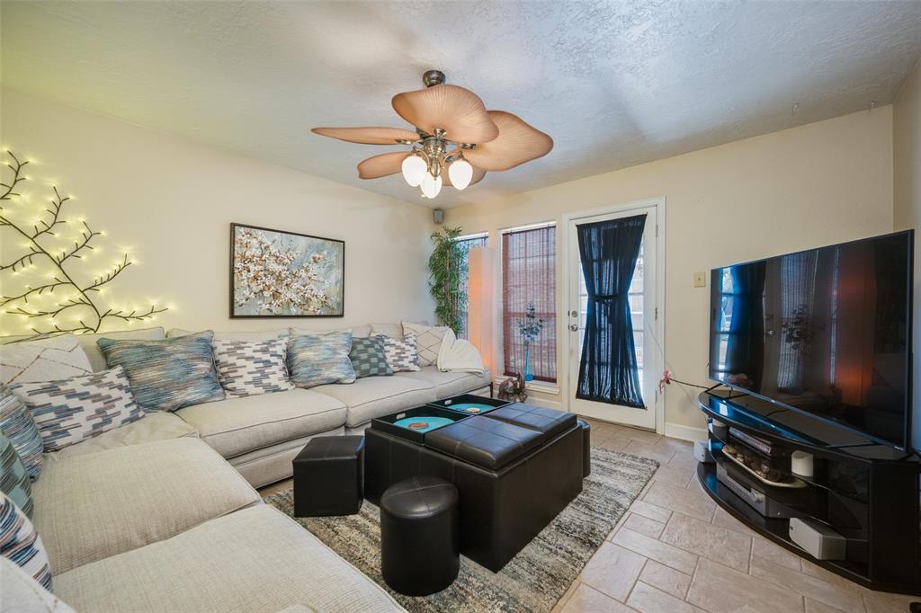 1 Finley Circle Krum, TX 76249 - Photo 20 of 30 a living room with furniture and a flat screen tv