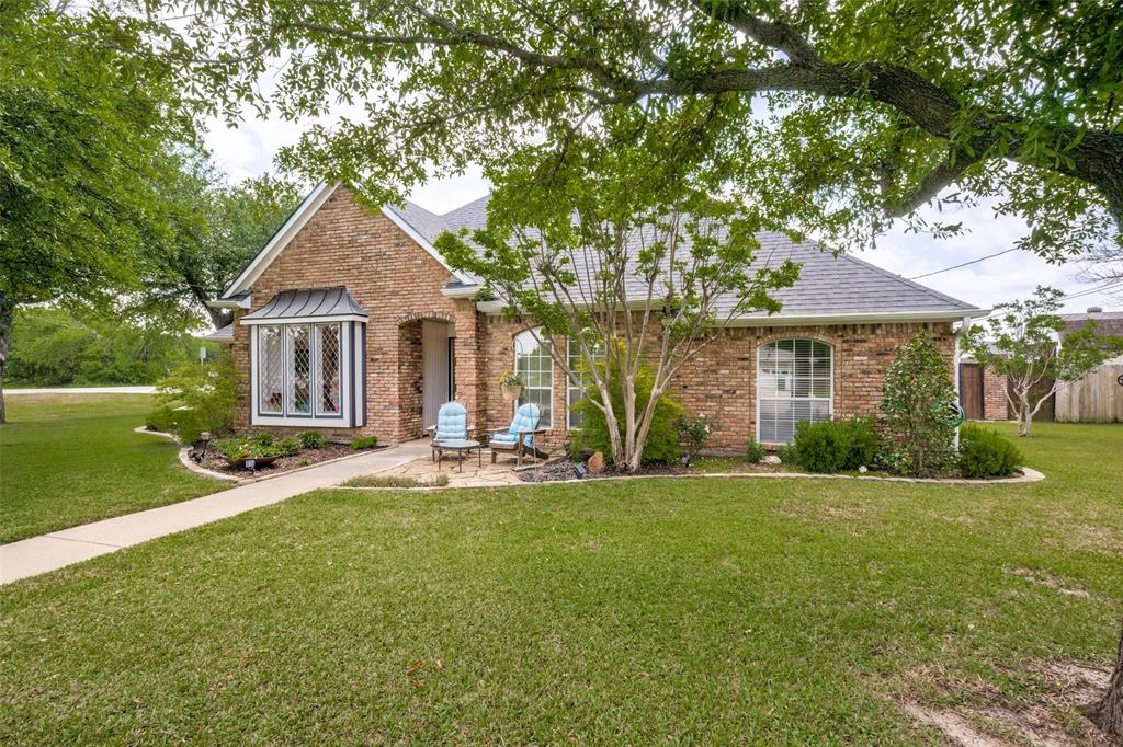 1 Finley Circle Krum, TX 76249 - Photo 2 of 30 a front view of a house with yard and green space