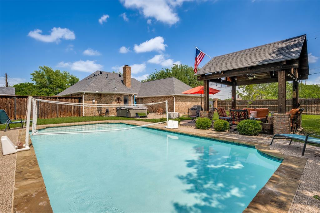 1 Finley Circle Krum, TX 76249 - Photo 22 of 30 a front view of house with outdoor space and swimming pool