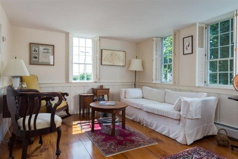 24 Champlain Road Chatham, MA 02633 - Photo 11 of 26 a living room with furniture and a window