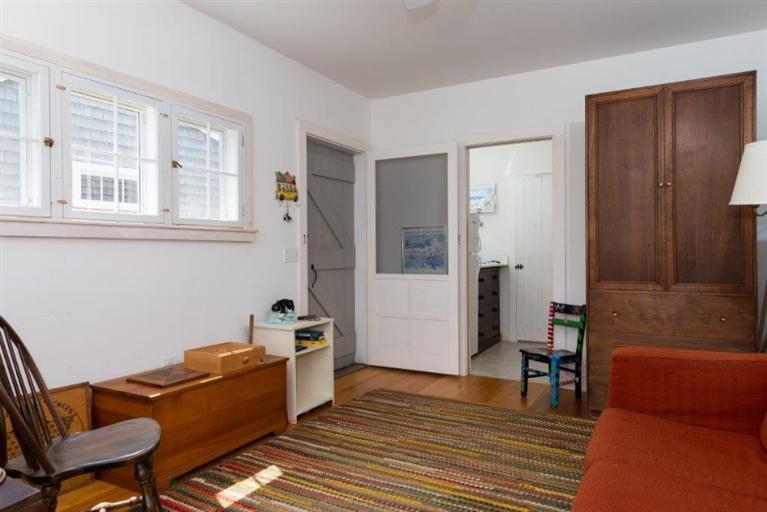 24 Champlain Road Chatham, MA 02633 - Photo 17 of 26 a room with furniture and a window