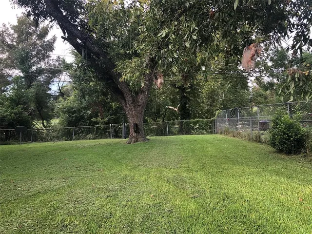 a view of outdoor space and yard