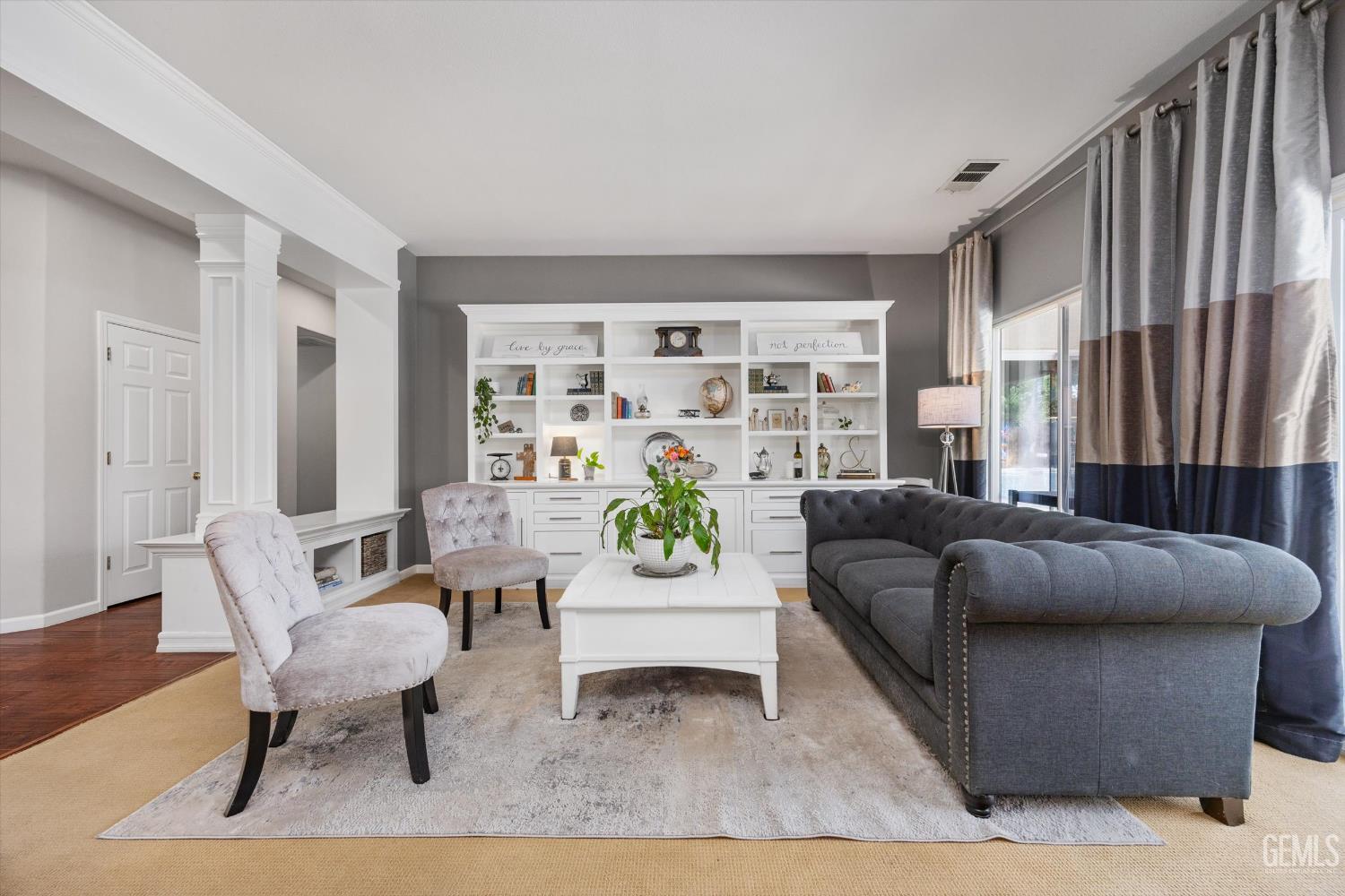 Undisclosed Address Bakersfield, CA 93312 - Photo 15 of 61 a living room with furniture and a rug