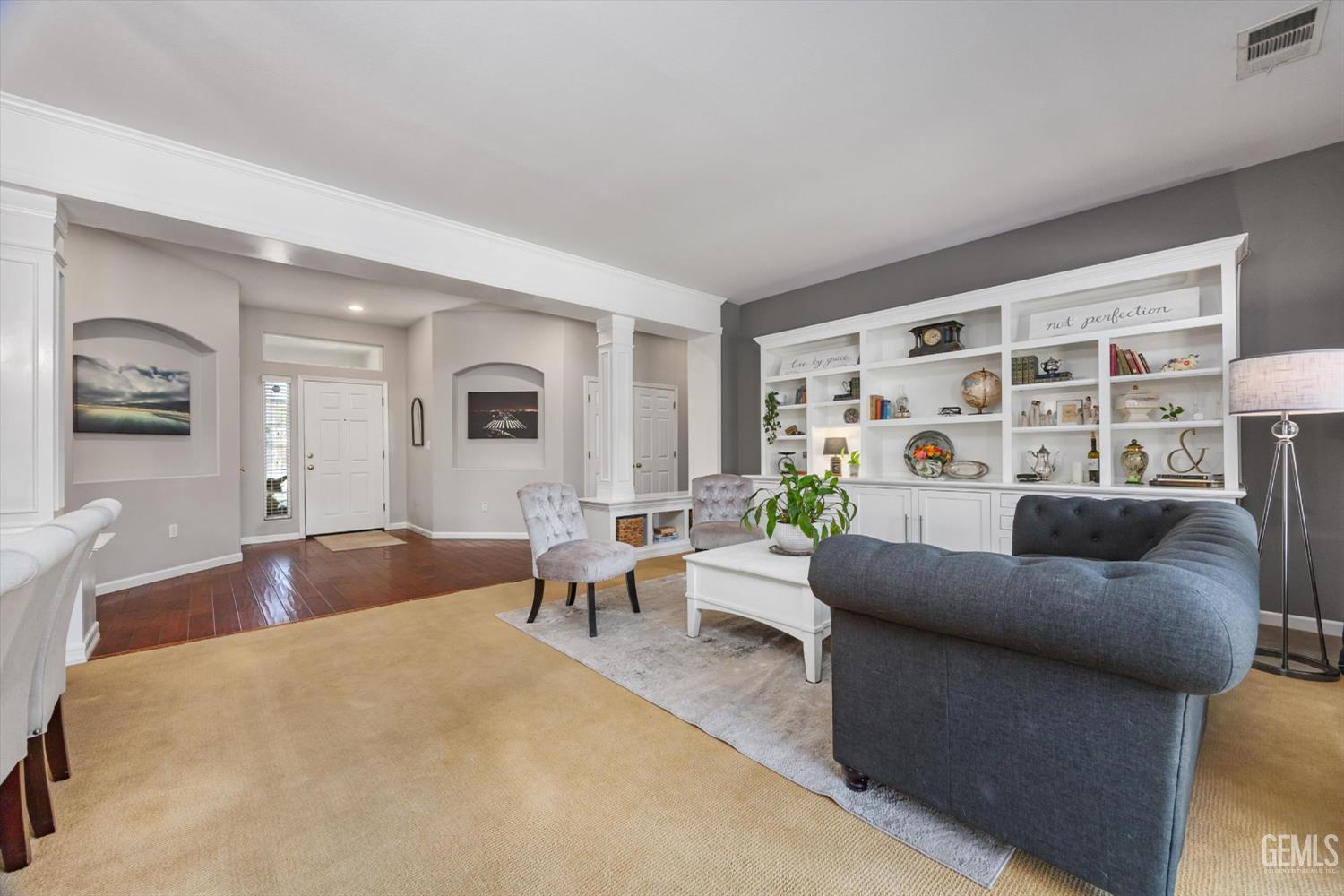 Undisclosed Address Bakersfield, CA 93312 - Photo 16 of 61 a living room with furniture and a large window