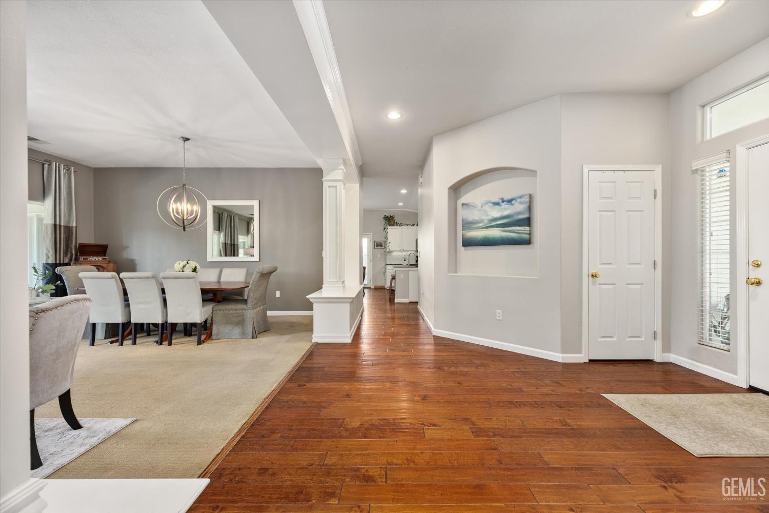 Undisclosed Address Bakersfield, CA 93312 - Photo 18 of 61 a view of a livingroom with furniture and wooden floor