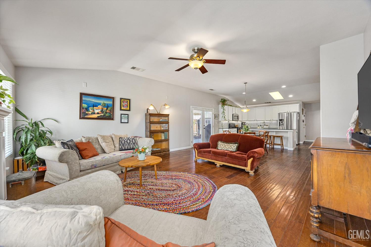 Undisclosed Address Bakersfield, CA 93312 - Photo 25 of 61 a living room with furniture kitchen view and a window
