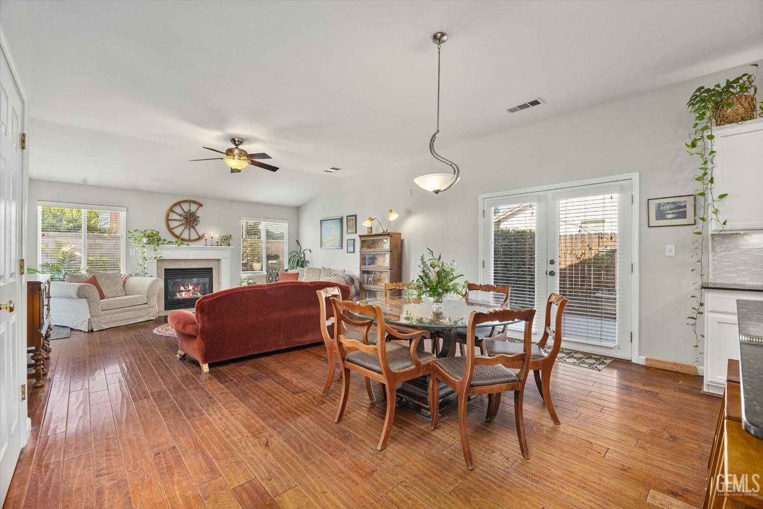 Undisclosed Address Bakersfield, CA 93312 - Photo 28 of 61 a view of a dining room with furniture window and wooden floor