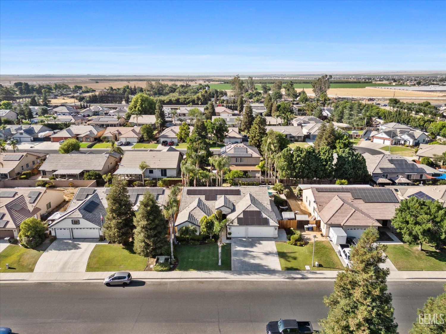 Undisclosed Address Bakersfield, CA 93312 - Photo 4 of 61 an aerial view of residential houses with city view
