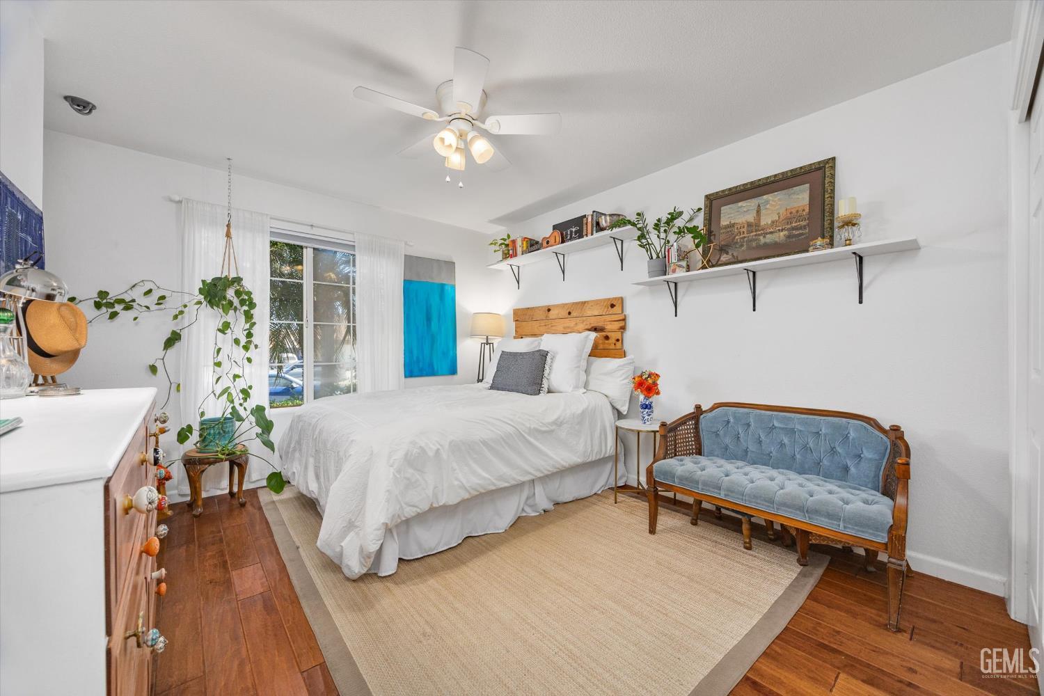 Undisclosed Address Bakersfield, CA 93312 - Photo 43 of 61 a bedroom with a bed and a chandelier