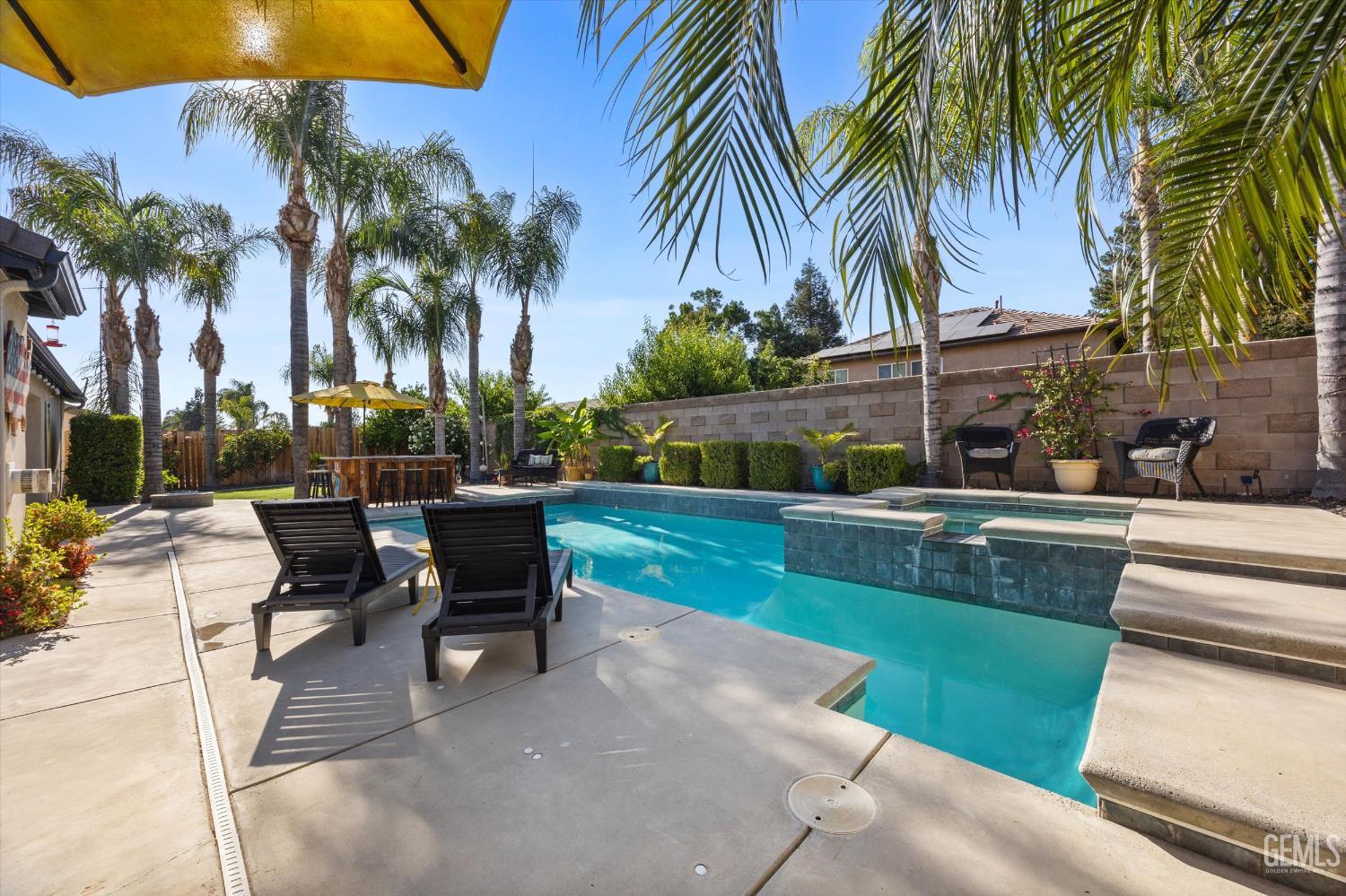 Undisclosed Address Bakersfield, CA 93312 - Photo 57 of 61 a view of a yard with a patio