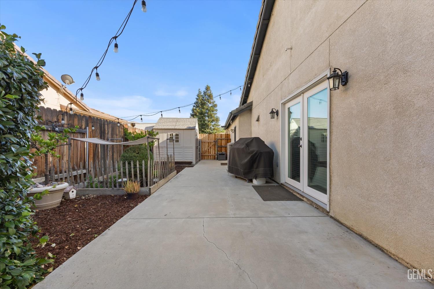 Undisclosed Address Bakersfield, CA 93312 - Photo 58 of 61 a view of a house with backyard and sitting area