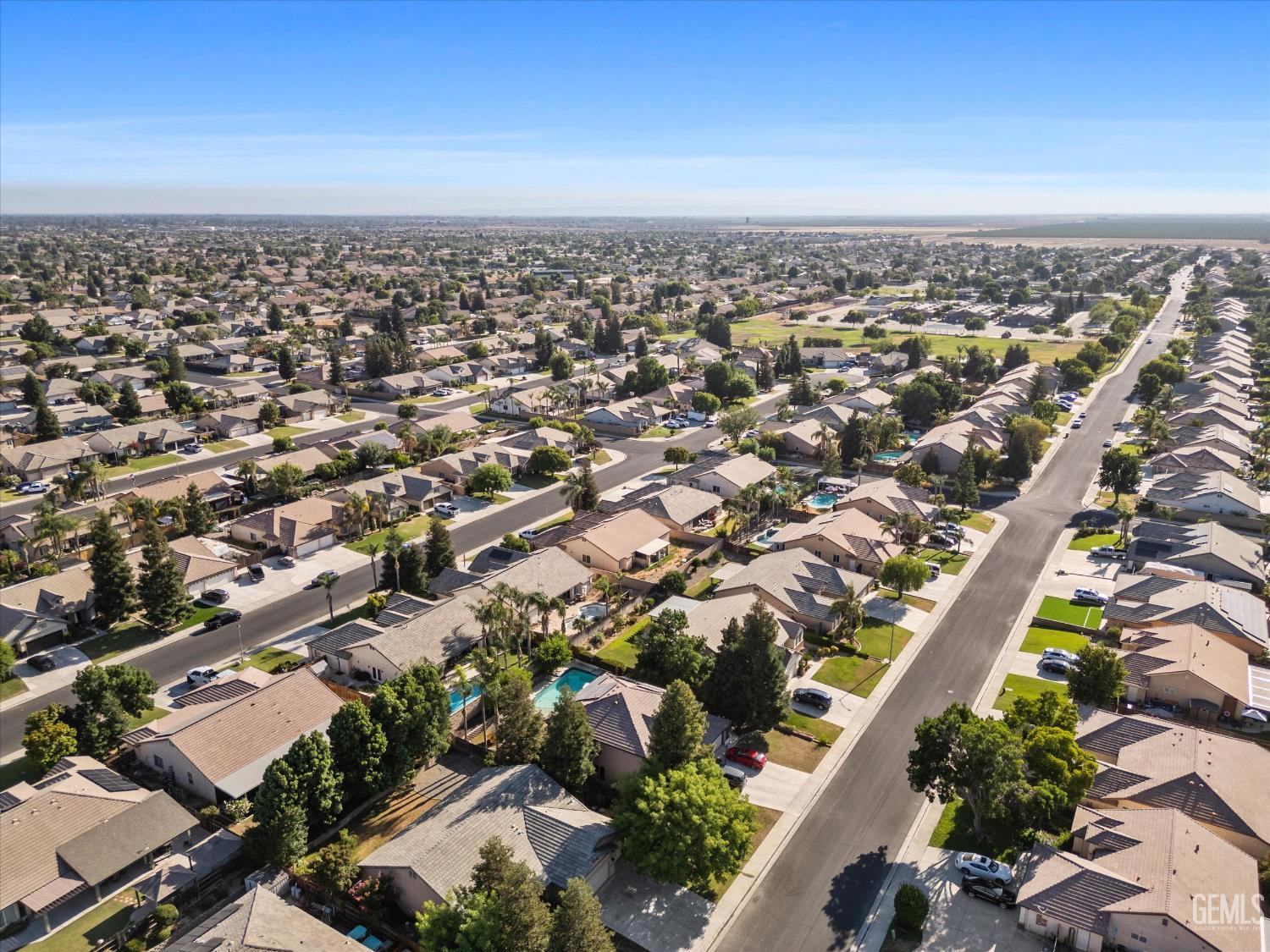 Undisclosed Address Bakersfield, CA 93312 - Photo 8 of 61 an aerial view of a city