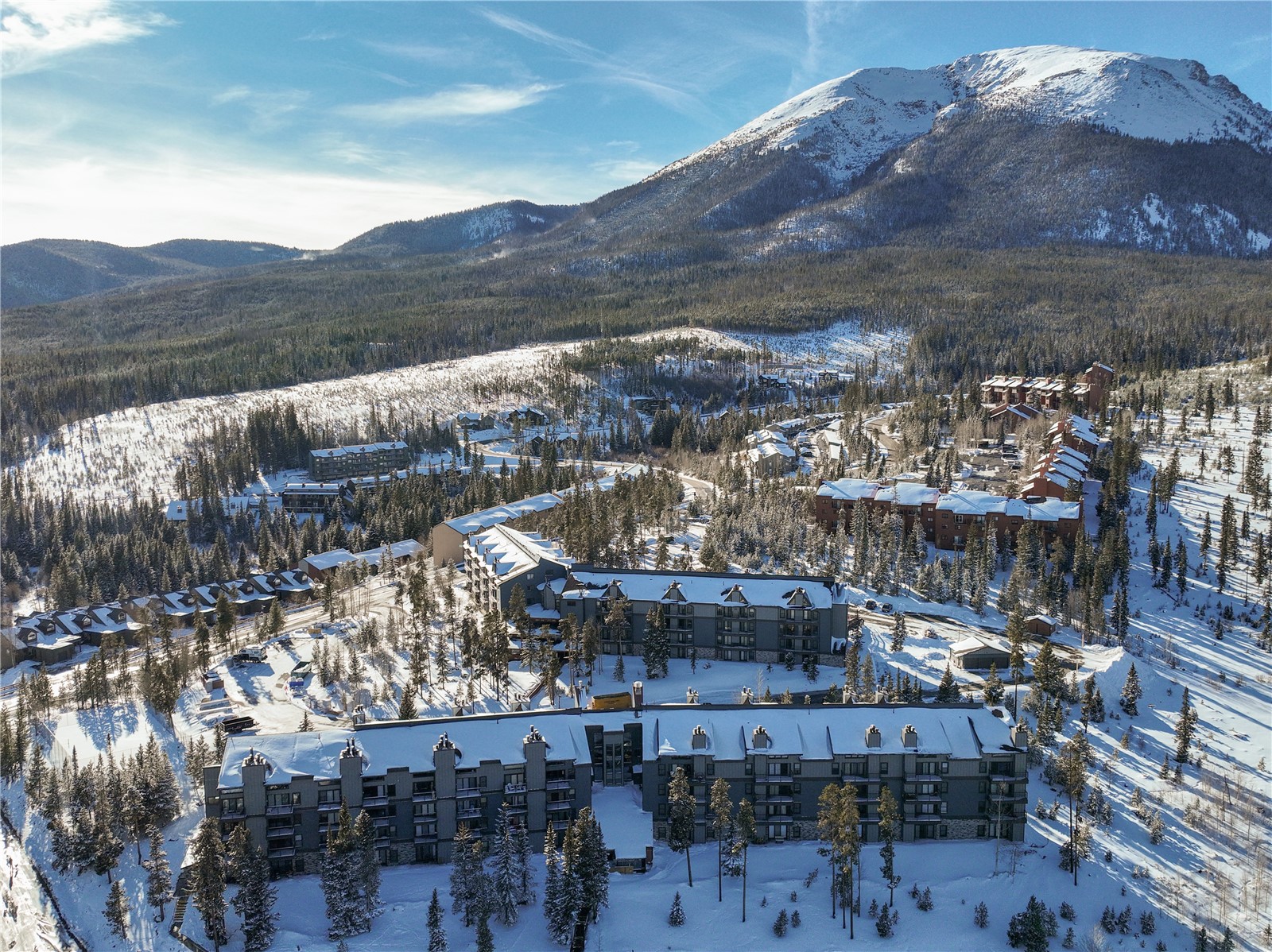 89410 Ryan Gulch Road, Unit 104 Silverthorne, CO 80498 - Photo 12 of 31 a view of a city with a mountain