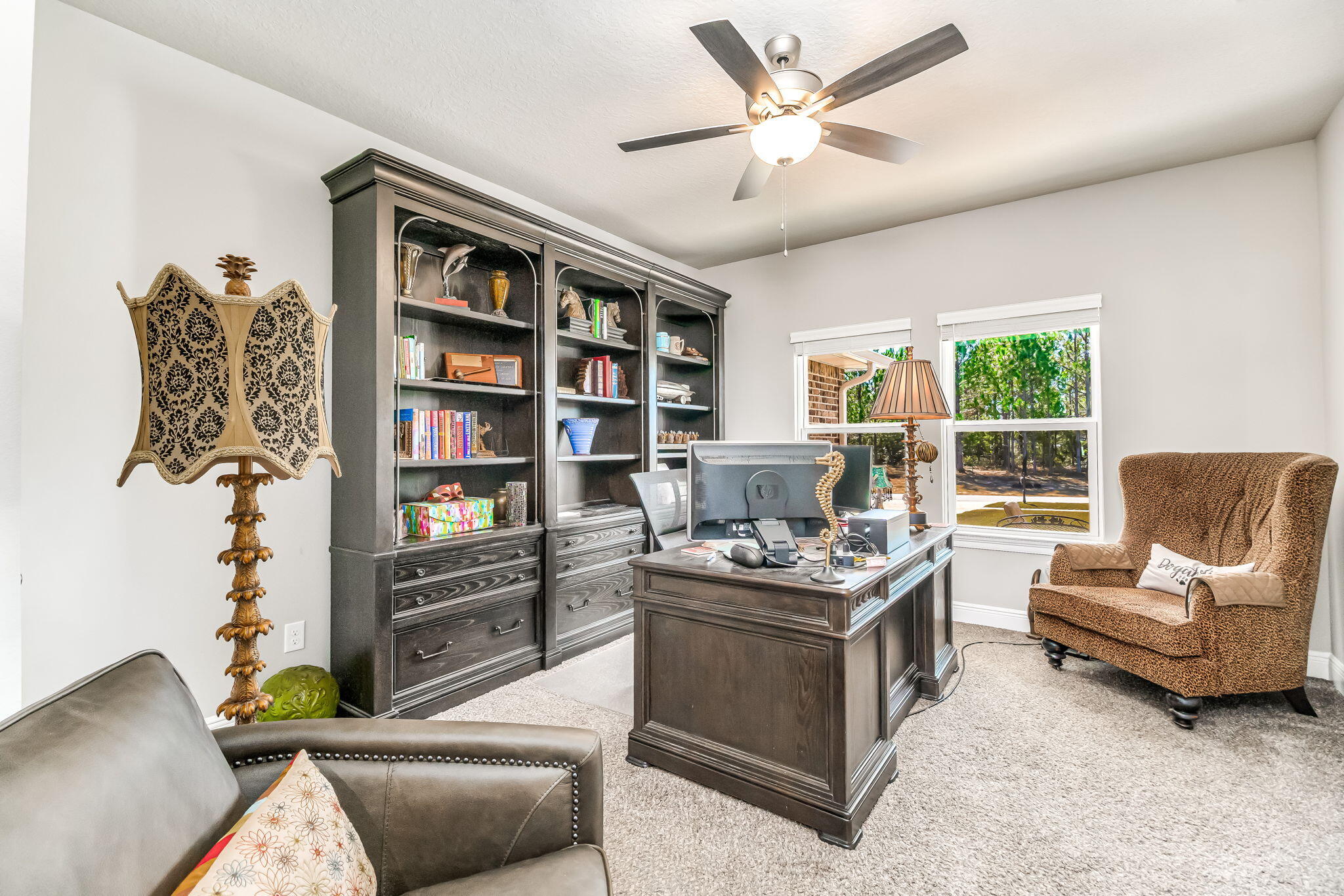 9188 Trident Road Milton, FL 32583 - Photo 15 of 47 a living room with furniture and a large window